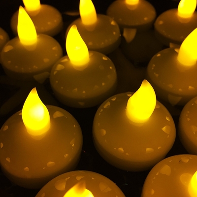 مجموعه ای از 12 چراغ نور شمع چراغ زرد Tealight با باتری جایگزین